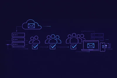 Team collaborating around a laptop with business email interface on screen